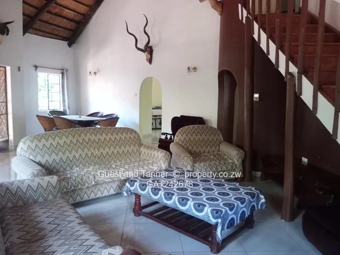 Ten bedroomed lodge under thatch for sale 