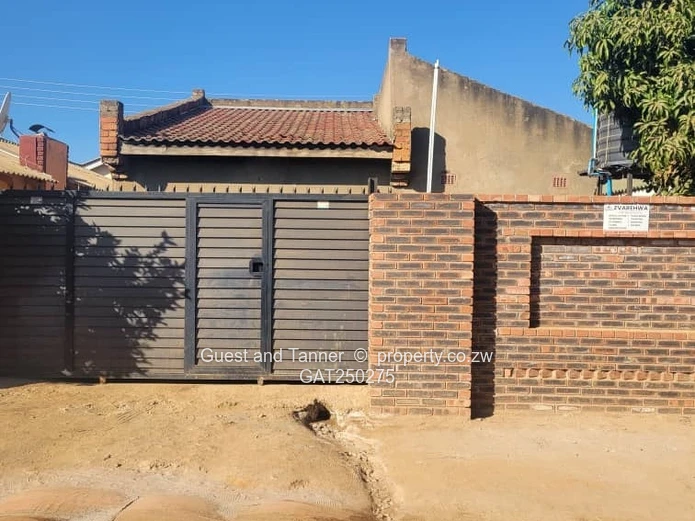 A neat 7-roomed, 4-bedroom house sitting on 200m², ideal for a family or as an investment property.