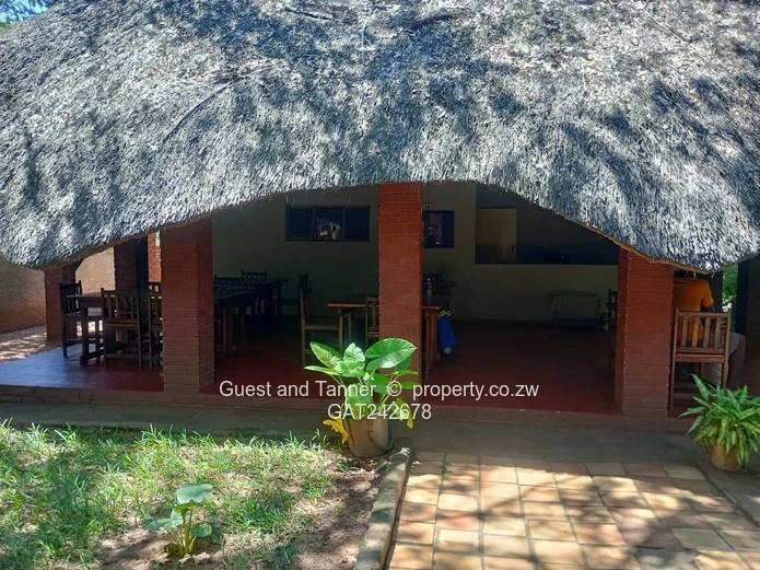 Ten bedroomed lodge under thatch for sale 