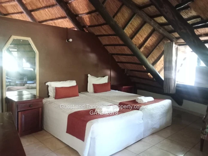 Ten bedroomed lodge under thatch for sale 