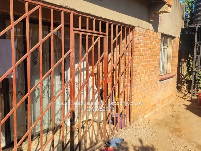 A neat 7-roomed, 4-bedroom house sitting on 200m², ideal for a family or as an investment property.