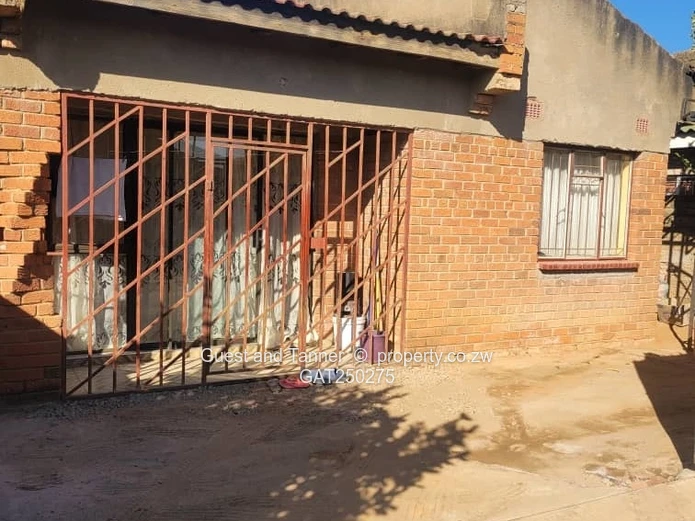 A neat 7-roomed, 4-bedroom house sitting on 200m², ideal for a family or as an investment property.